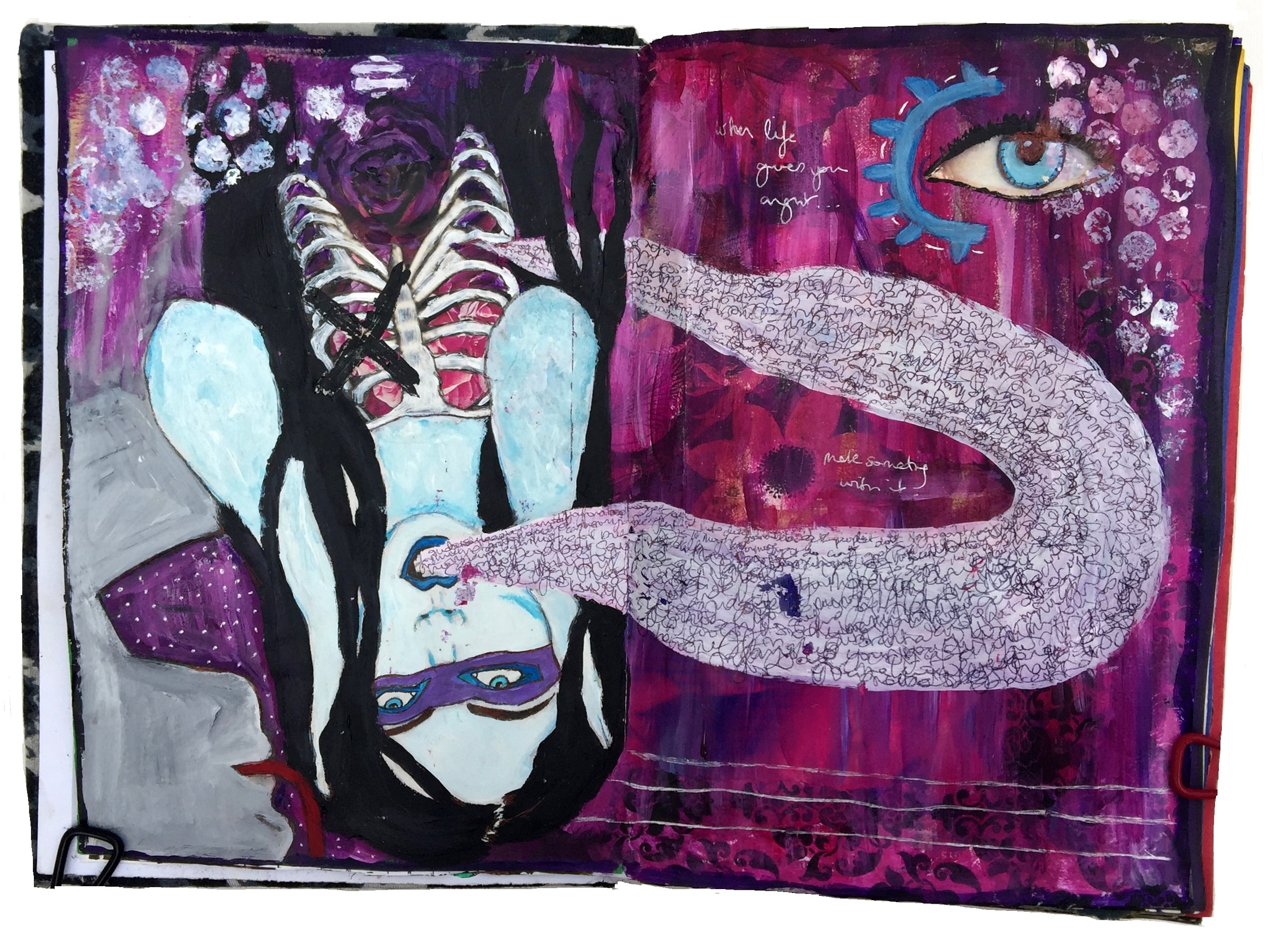 A mixed media art journal collage of an upside down woman with her rib cage exposed and flowers underneath.