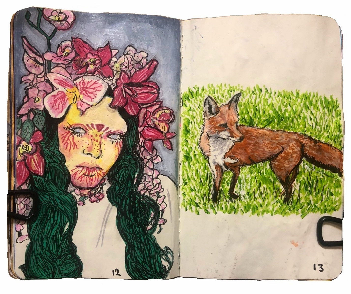 An art journal page with an illustrated portrait of a person with long, wavy dark green hair, surrounded by large pink flowers. On the right is an illustration of a red fox standing on green grass.