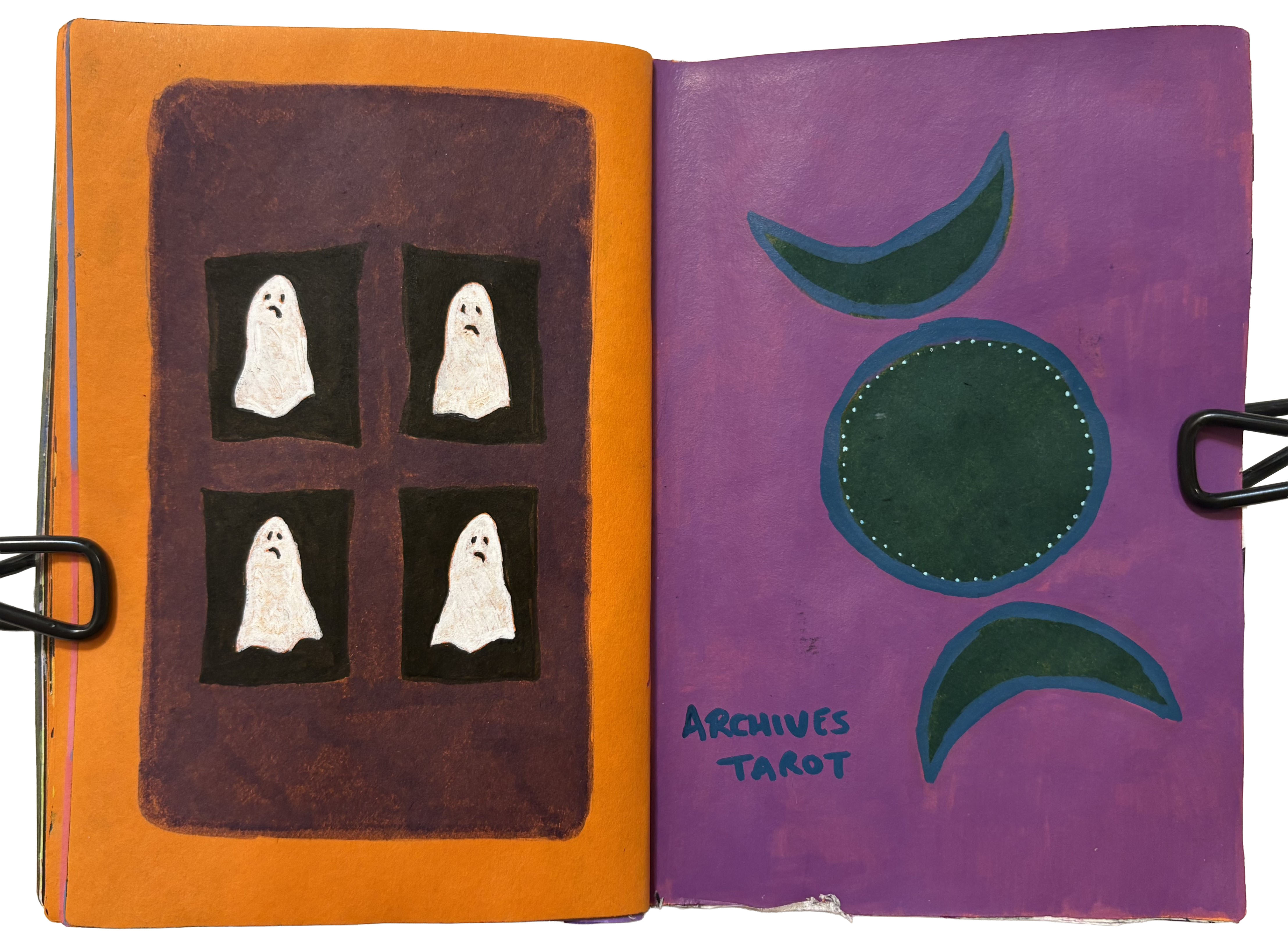 A mixed media art journal page with testers for an archives tarot deck I created for an outreach event at work. It includes illustrations of ghosts and the triple moon goddess symbol.