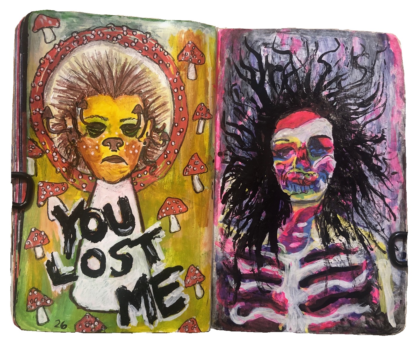 An illustrated art journal with colorful abstract illustrations of two figures and mushroom motifs.