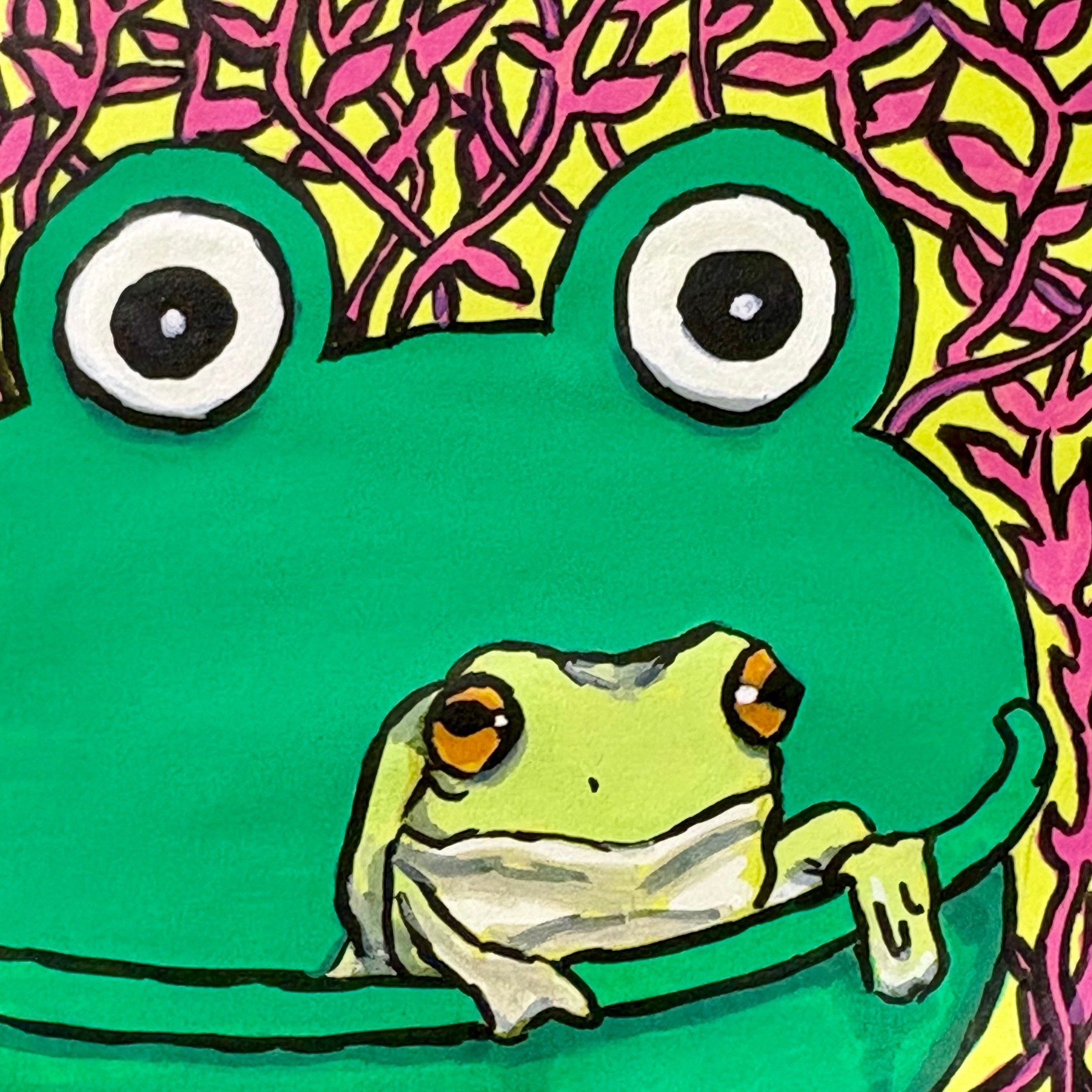 An illustration of a green frog in a bigger plastic frog looking kind of stoned and contemplating existence. There are doodles of pink leaves around the frogs. The illustration was created with acrylic markers on a sticky note.